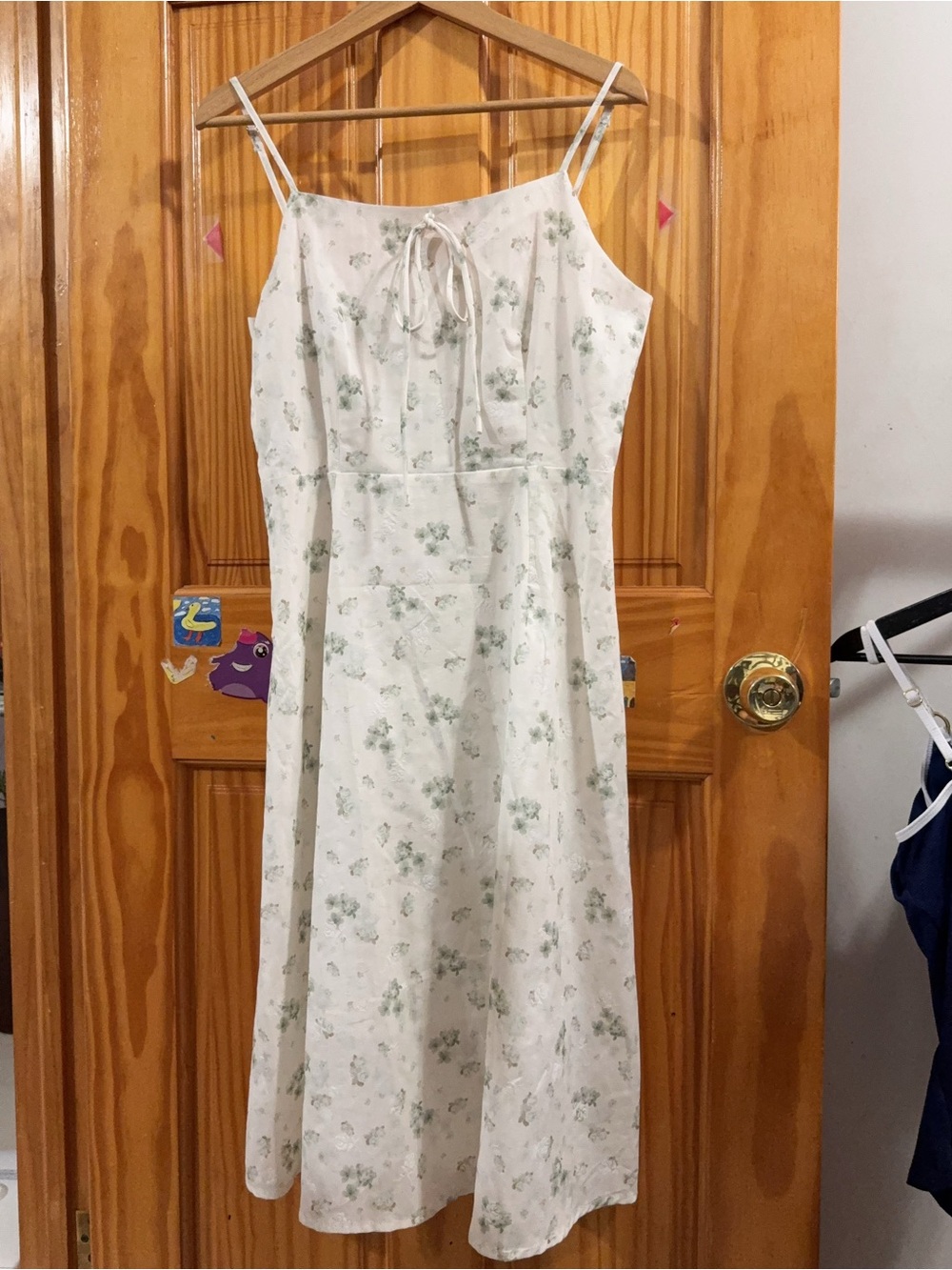 Sleeveless Cream Midi Dress with Green Floral Print